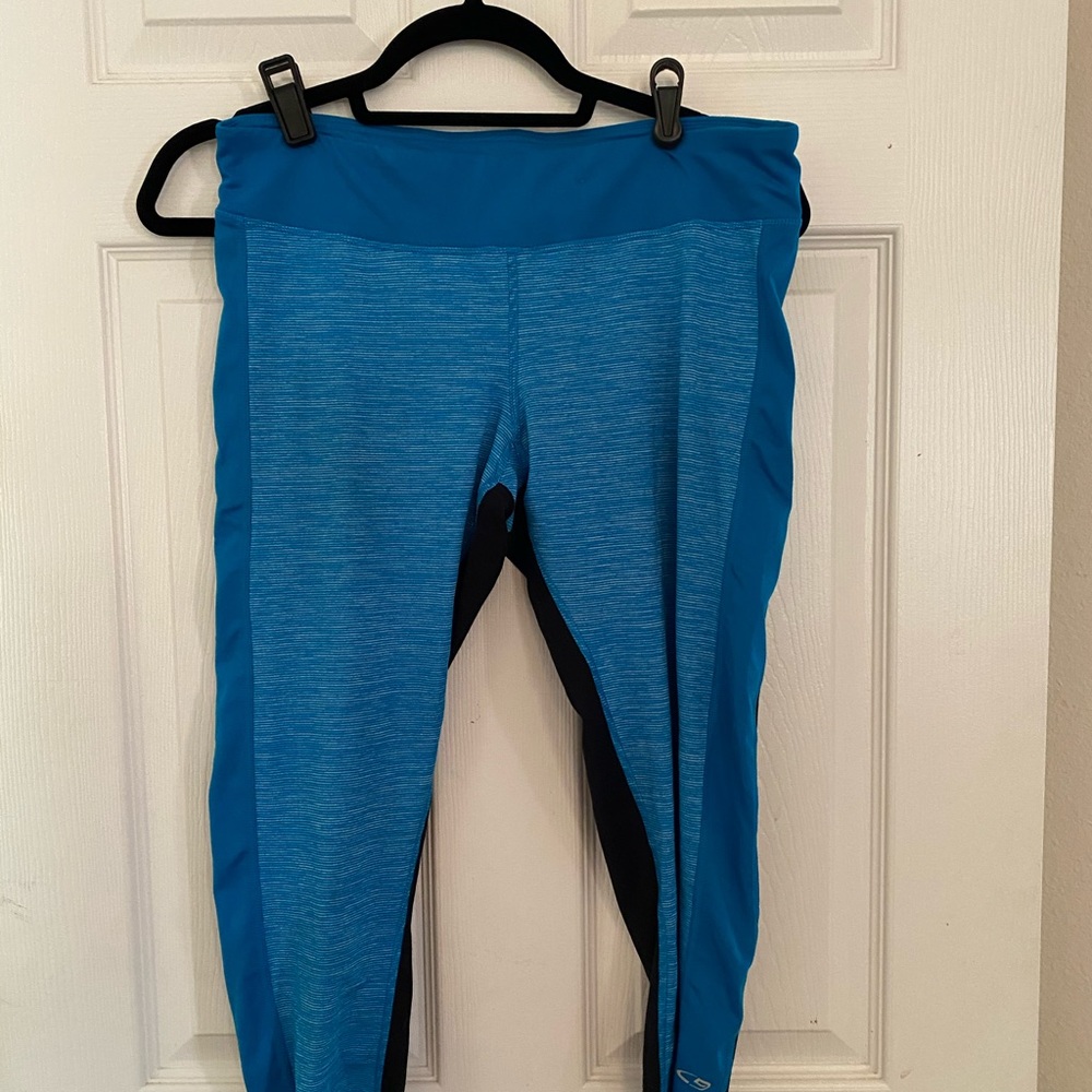 Black and teal workout capris